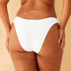 Women's Extra High Leg Eyelet Low-Rise Extra Cheeky Bikini Bottom - Wild Fable™ 9 Women's Extra High Leg Eyelet Low-Rise Extra Cheeky Bikini Bottom - Wild Fable™ -Wild Fable Store GUEST 18b016bc 6c93 4100 b5eb 48b96f1a45fe