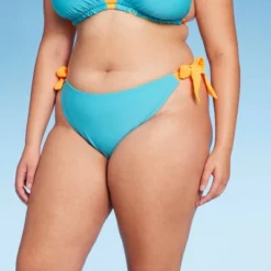 Women's Reversible Side-Tie High Leg Cheeky Bikini Bottom - Wild Fable™ 26 Women's Reversible Side-Tie High Leg Cheeky Bikini Bottom - Wild Fable™ -Wild Fable Store GUEST 77467828 c896 481d bb3b 24b2ec704c16