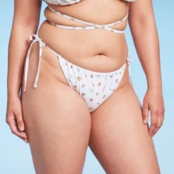 Women's Floral Print Side-Tie Ultra High Leg Adjustable Coverage Bikini Bottom - Wild Fable™ White 11 Women's Floral Print Side-Tie Ultra High Leg Adjustable Coverage Bikini Bottom - Wild Fable™ White -Wild Fable Store GUEST a76abeab 66b2 4843 943b d7f414064e80