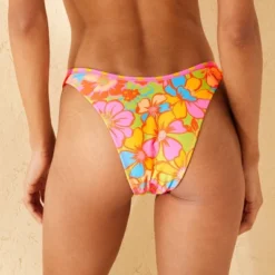 Women's Reversible Contrast Binding Mid-Rise High Leg Cheeky Bikini Bottom - Wild Fable™ Green Floral Print/Pink Striped